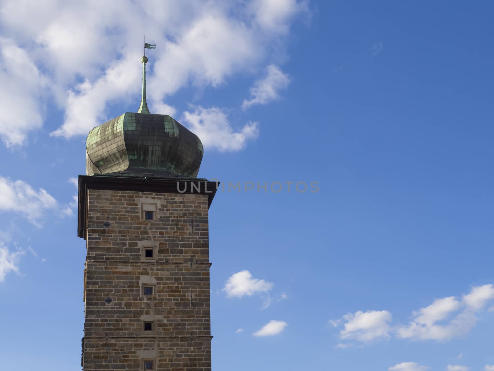 Sitkovska water tower at Prague old town, blue sky white clouds.