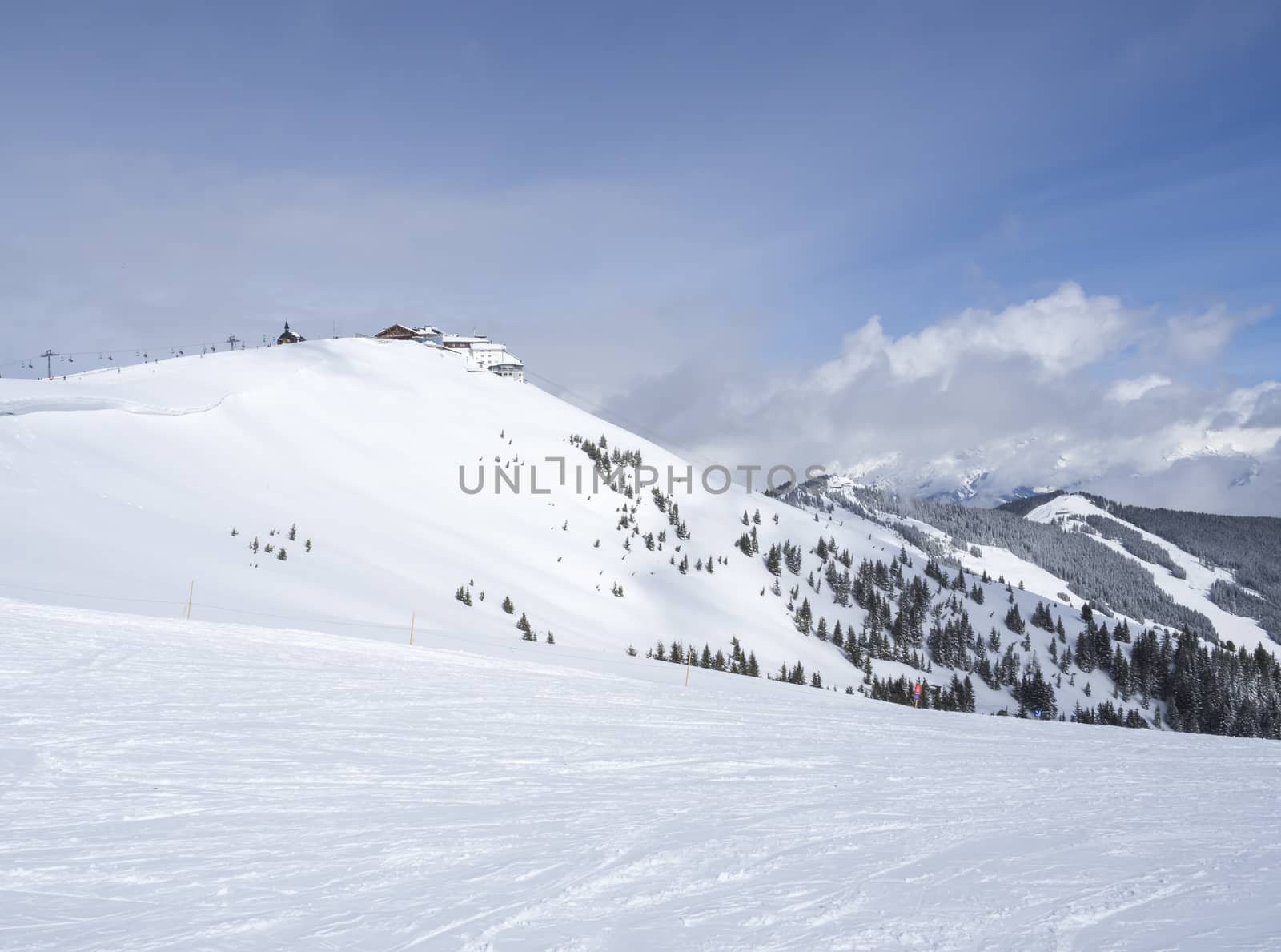 view on the top of Smittenhohe mountain at Kaprun ski area Blue sky sunny winter day.