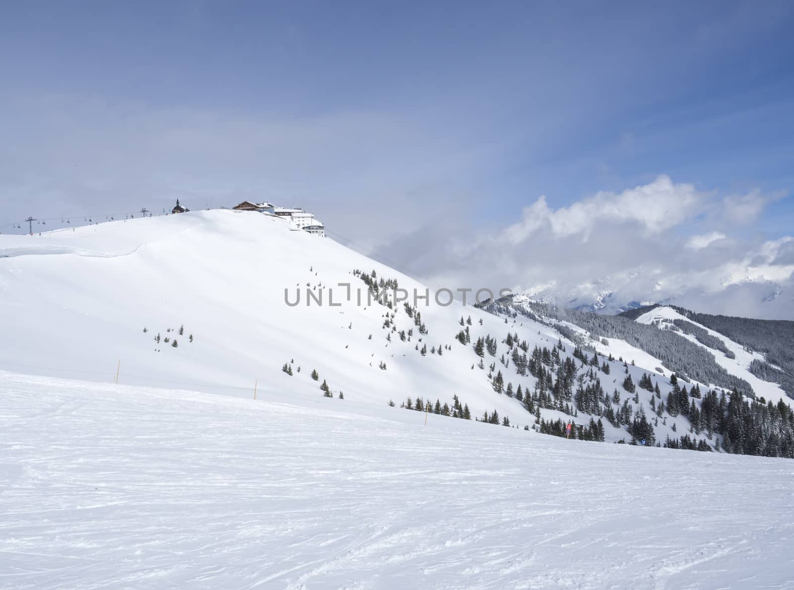 view on the top of Smittenhohe mountain at Kaprun ski area Blue sky sunny winter day by Henkeova