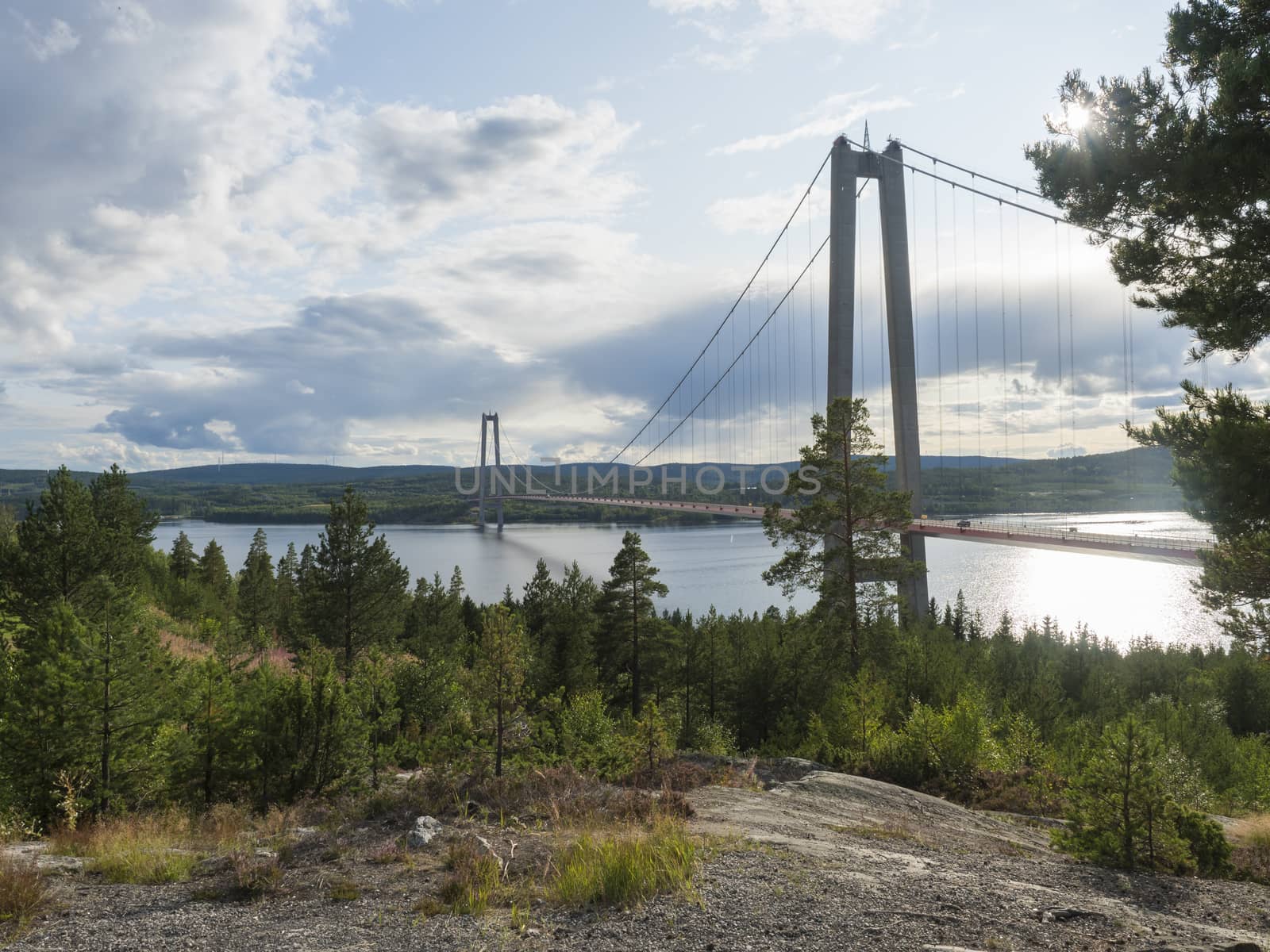 Summer view of the High coast bridge Hogakustenbron seen from the north bank of the river Angermanalven located near Harnosand in Vaesternorrland, Sweden