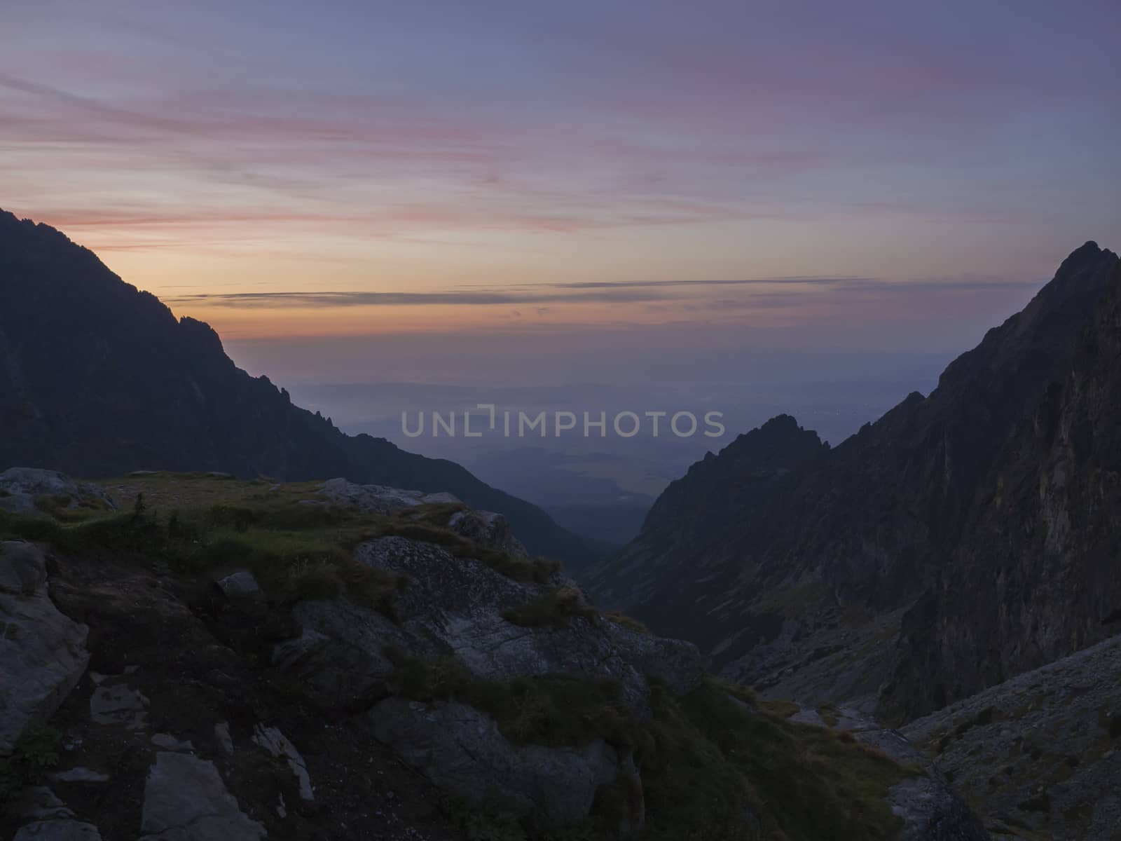 Orange Sunset or sunrise sk, view form teryho chata cabin to valley, High Tatras mountains, Slovakia.