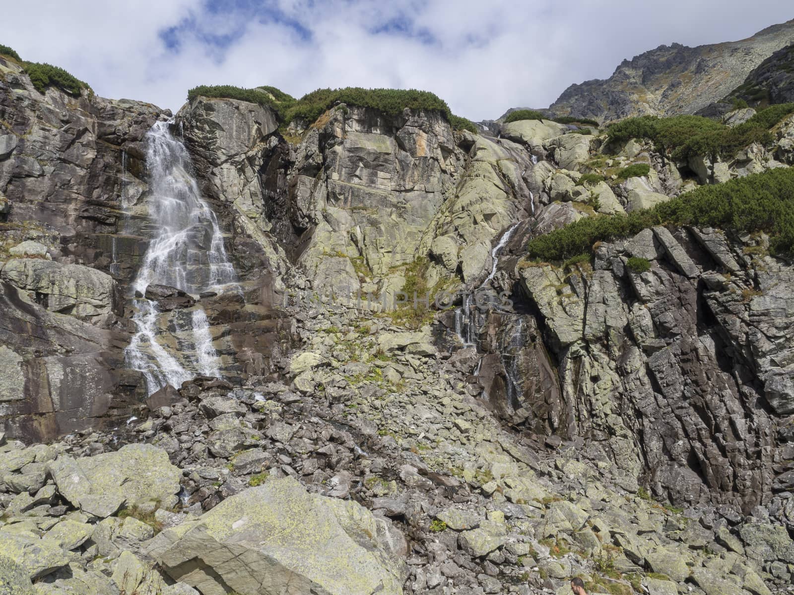 Skok waterfall High Tatras mountain, summer sunny day, Strbske Pleso, Slovakia.