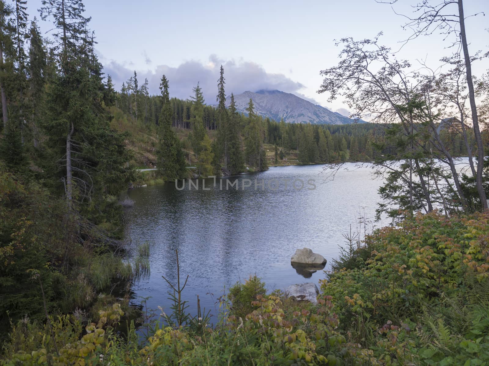 Mountain lake Strbske pleso in National Park High Tatra, Slovakia, Europe, summer at dusk.