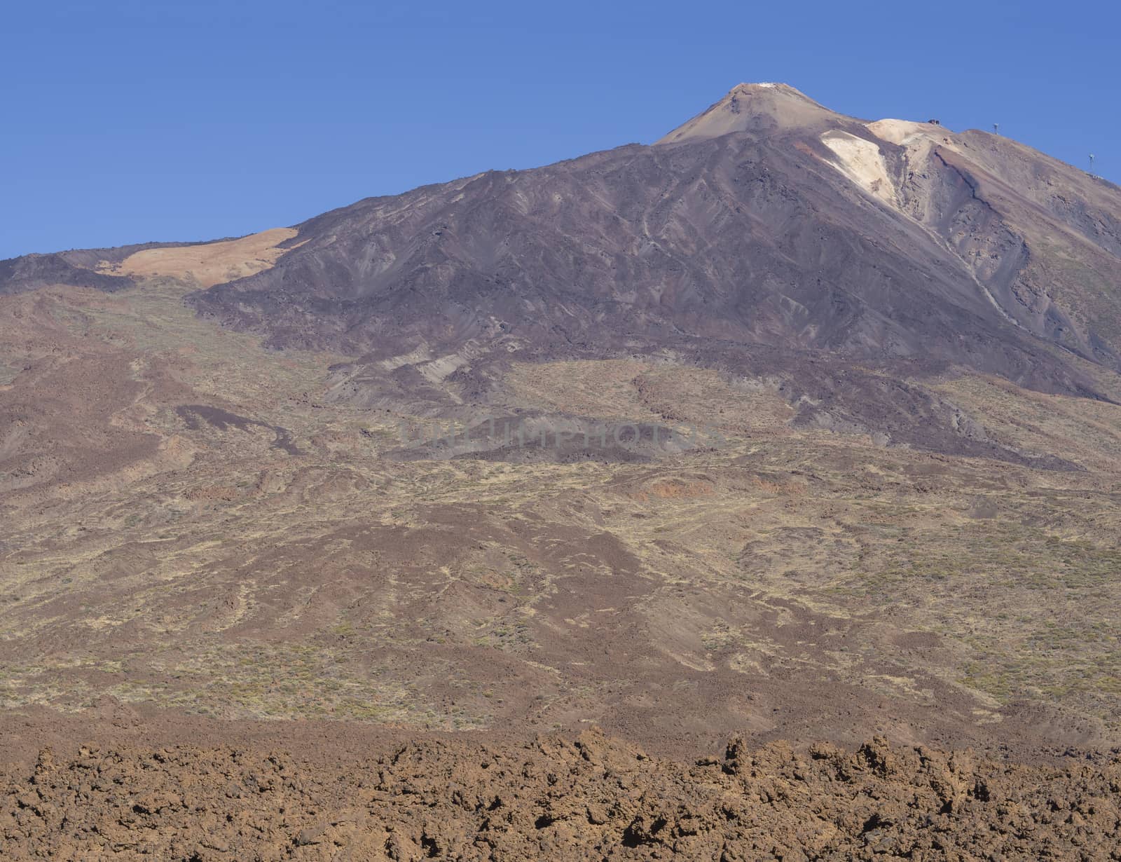 view on colorful volcano pico del teide highest spanish mountain in tenerife canary island with clear blue sky background horizontal
