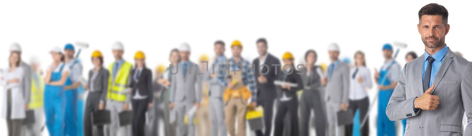 Businessman with thumb up in front of crowd of different industries professions people cooperation job search staff management concept
