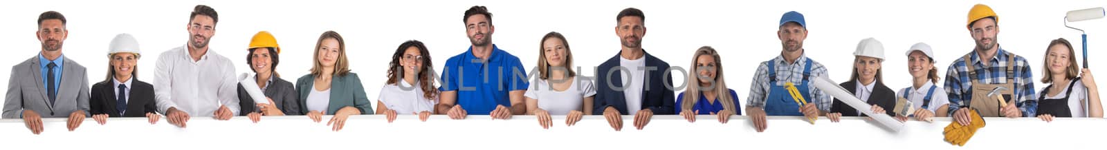 Group of diverse professionals presenting empty banner isolated on white background business construction industry