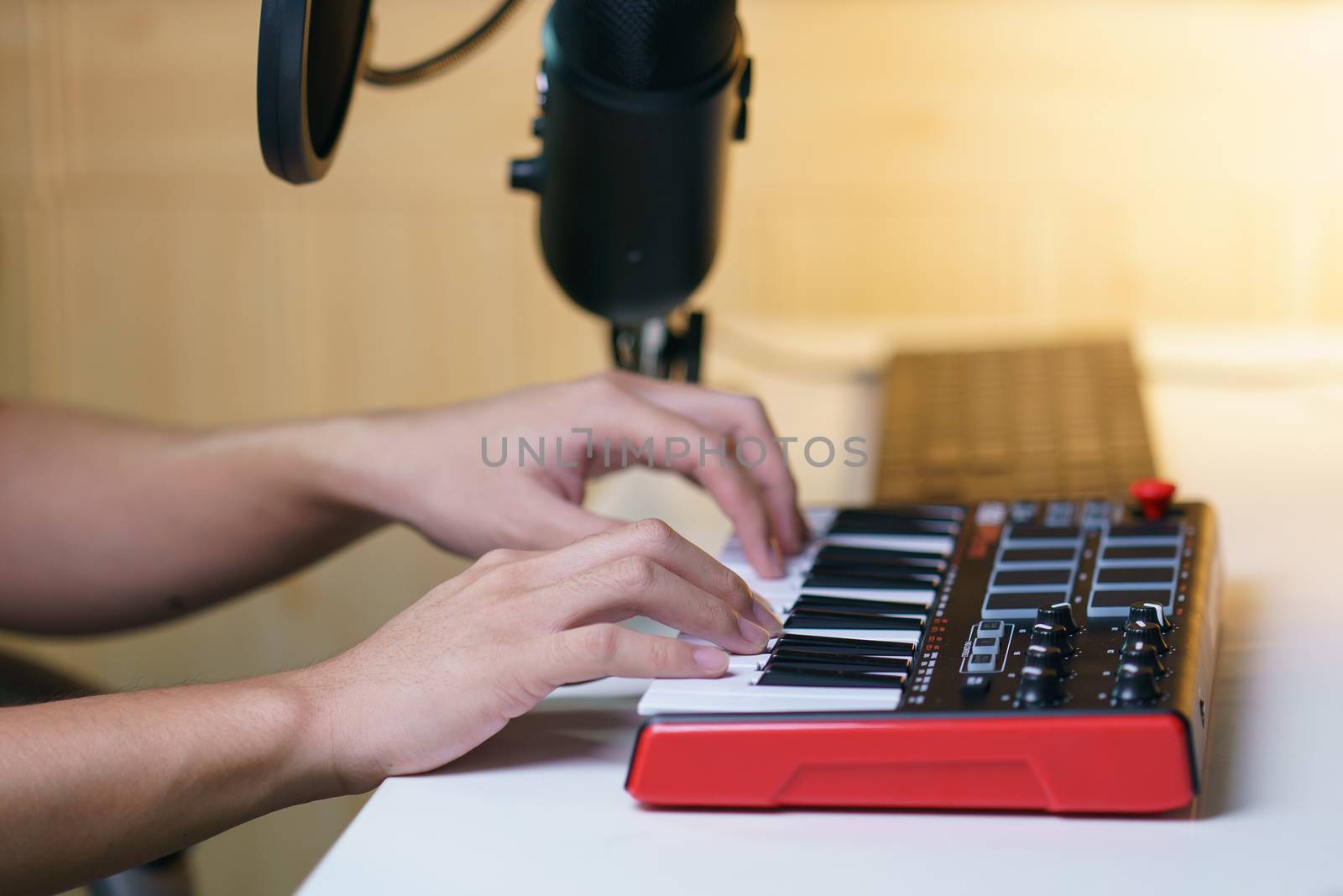 Hand using sound mixing console board. Equipment for the music studio.