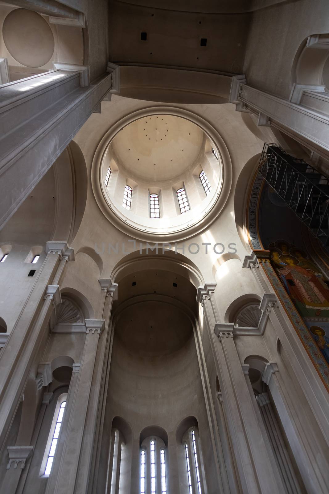 Holy Trinity Cathedral of Tbilisi, Georgia Interior is the main cathedral of the Georgian Orthodox Church Constructed between 1995 and 2004, it is the third-tallest Eastern Orthodox cathedral in the world and one of the largest religious buildings in the world by total area Beautiful icons and architecture 9/10/2019. High quality photo