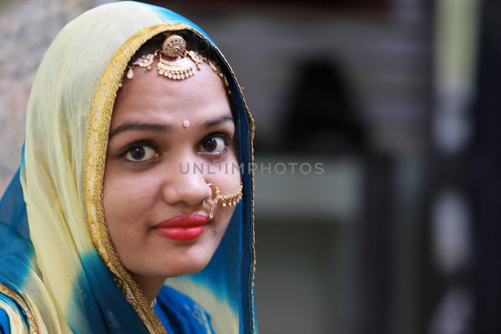 Close up of A beautiful woman in Rajasthani styles and make-up of Indian culture