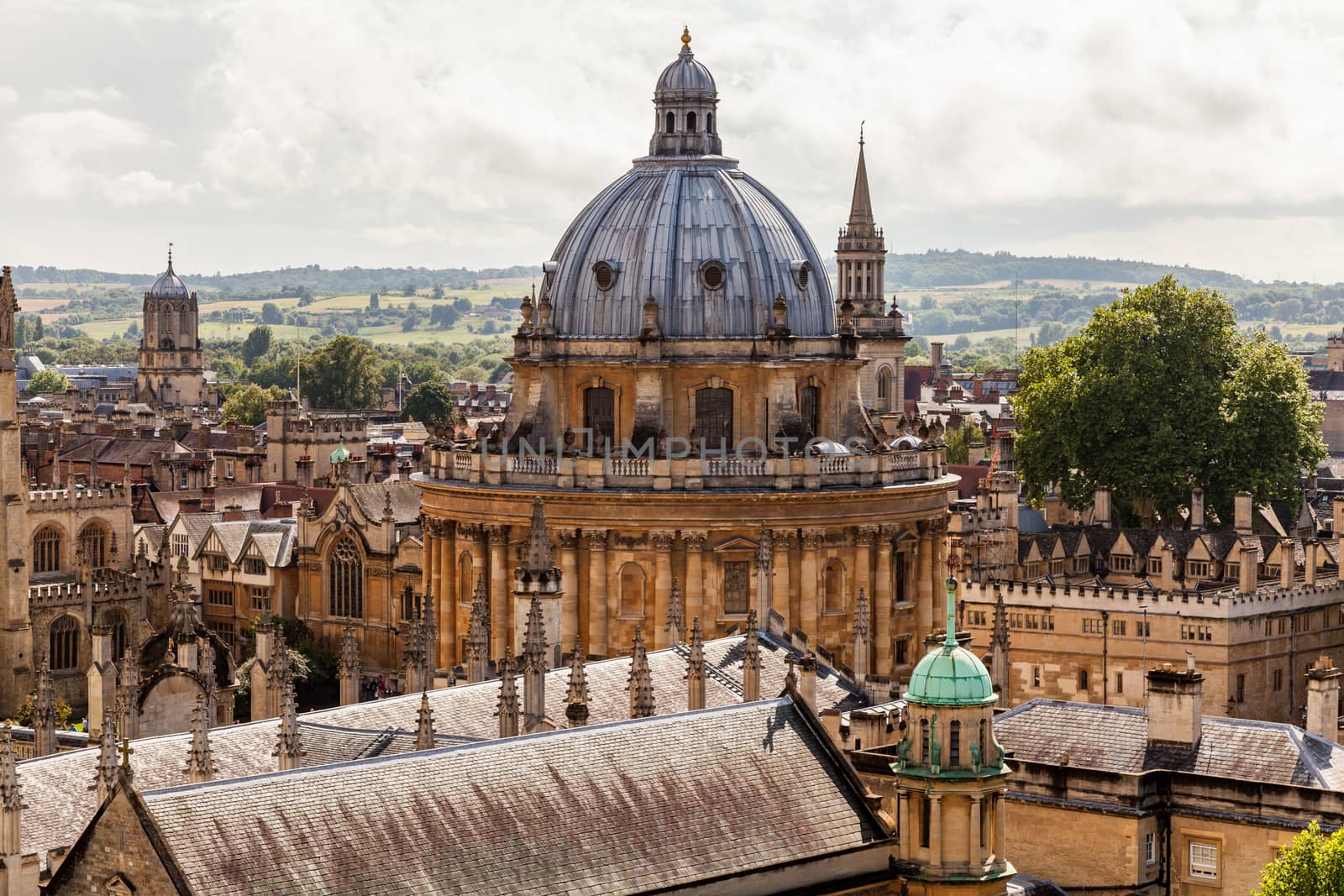 Oxford city skyline with Radcliffe Camera in foreground, unusual view with the countryside of Boars Hill in the background. Showing the Dreaming Spires of the city centre and the location in the greater landscape. 