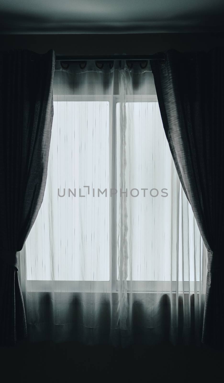 white see through sheer window curtain at home. transparent fabric