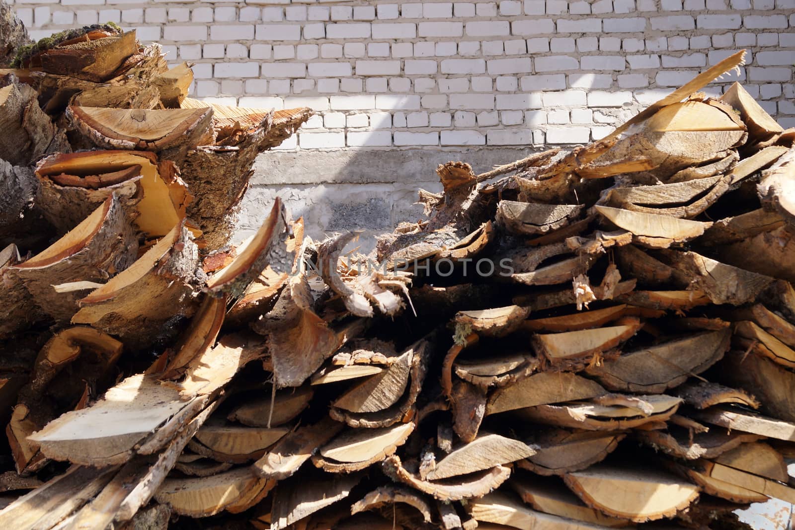 waste from wood production, bark trimming in the open air by Annado