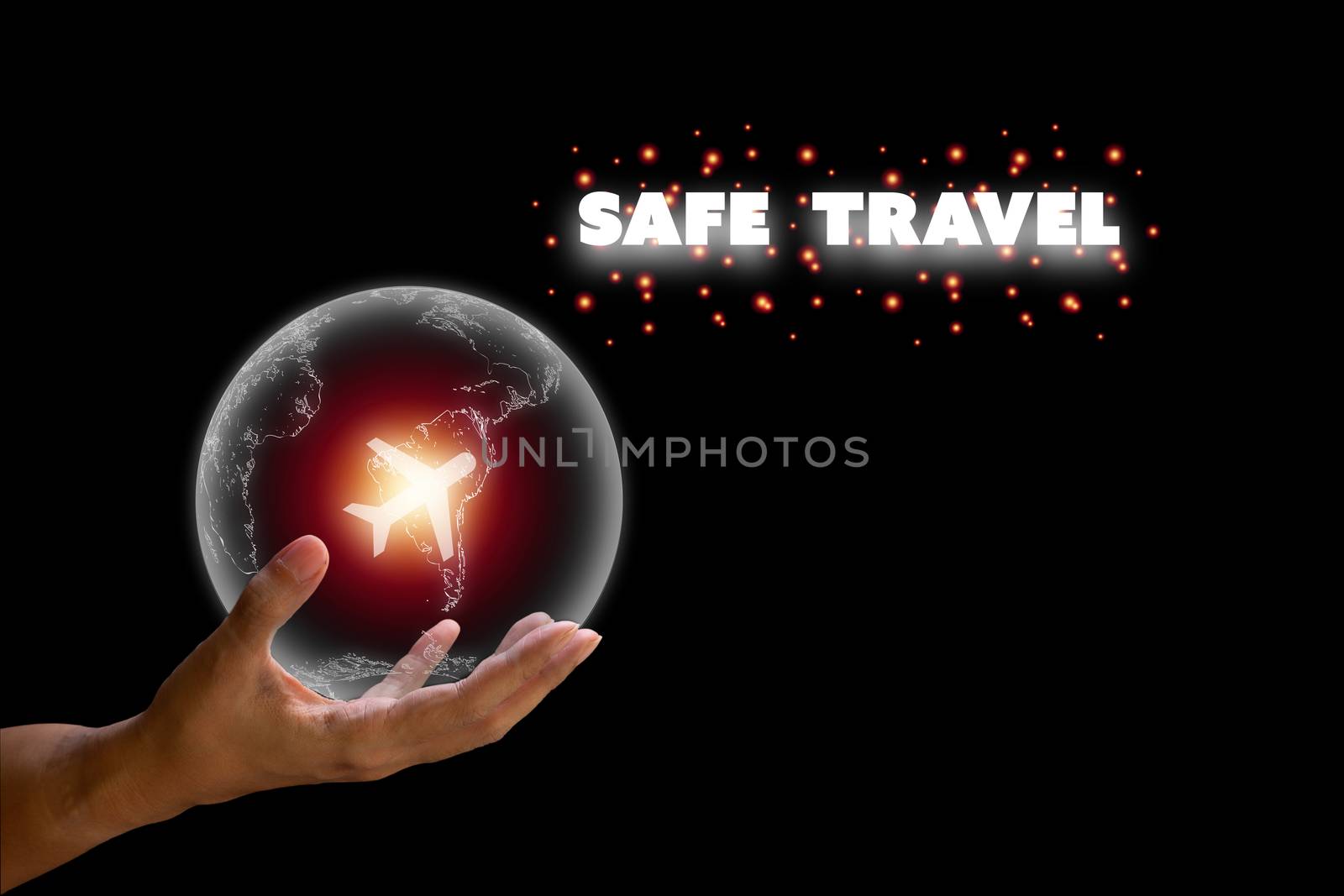 Safe travel concept. Hand hold transparent earth with white plane icon and orange light on black background with copy space.