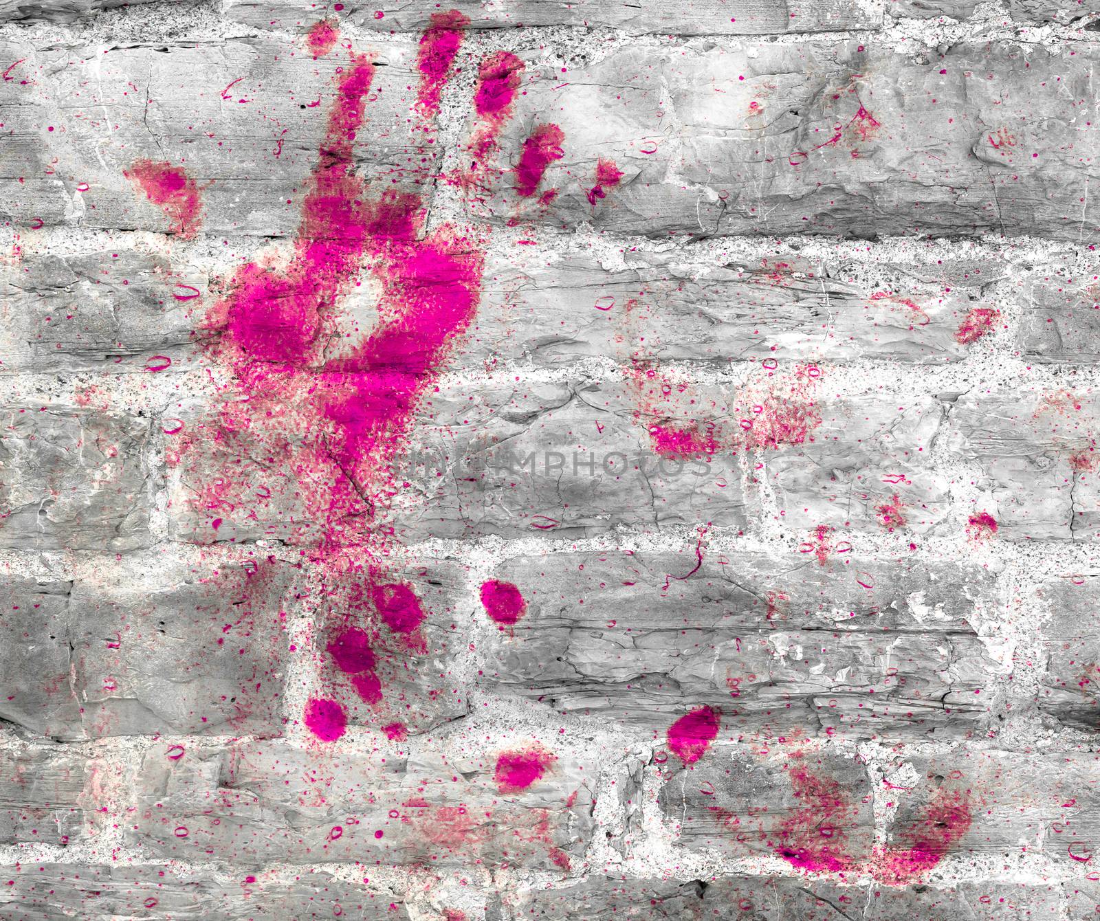Pink handprint on stone wall. Ideal for your creative background.