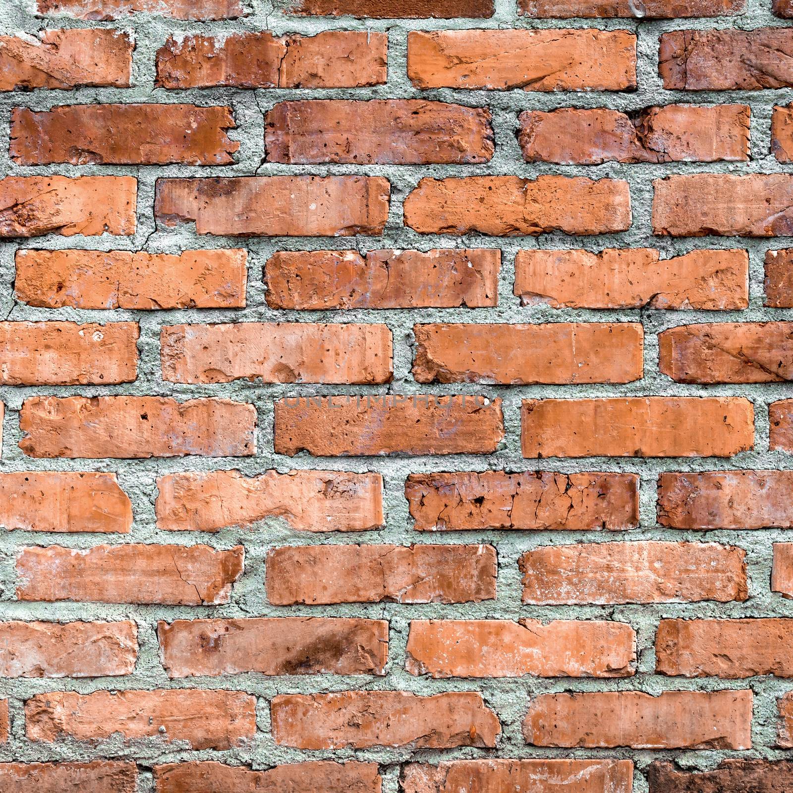 Rustic orange clay brick work wall texture