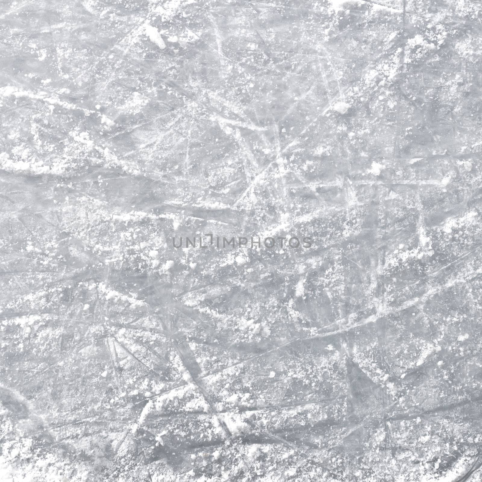 Ice rink floor, detail of a textured background ice, winter sports.