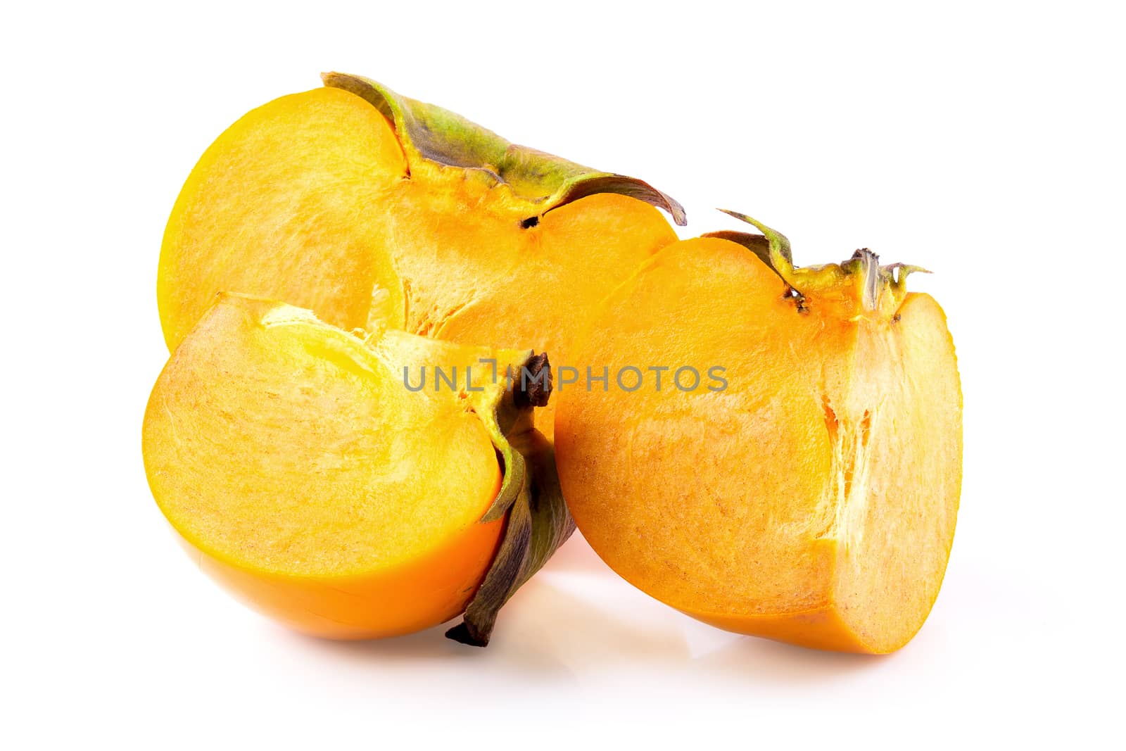 fresh persimmons and persimmon slice with leaf isolated on white by kaiskynet