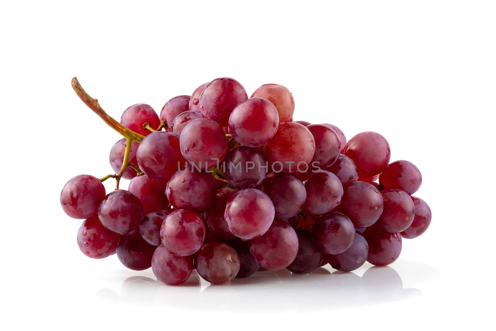 Red Grapes isolated on over white background by kaiskynet