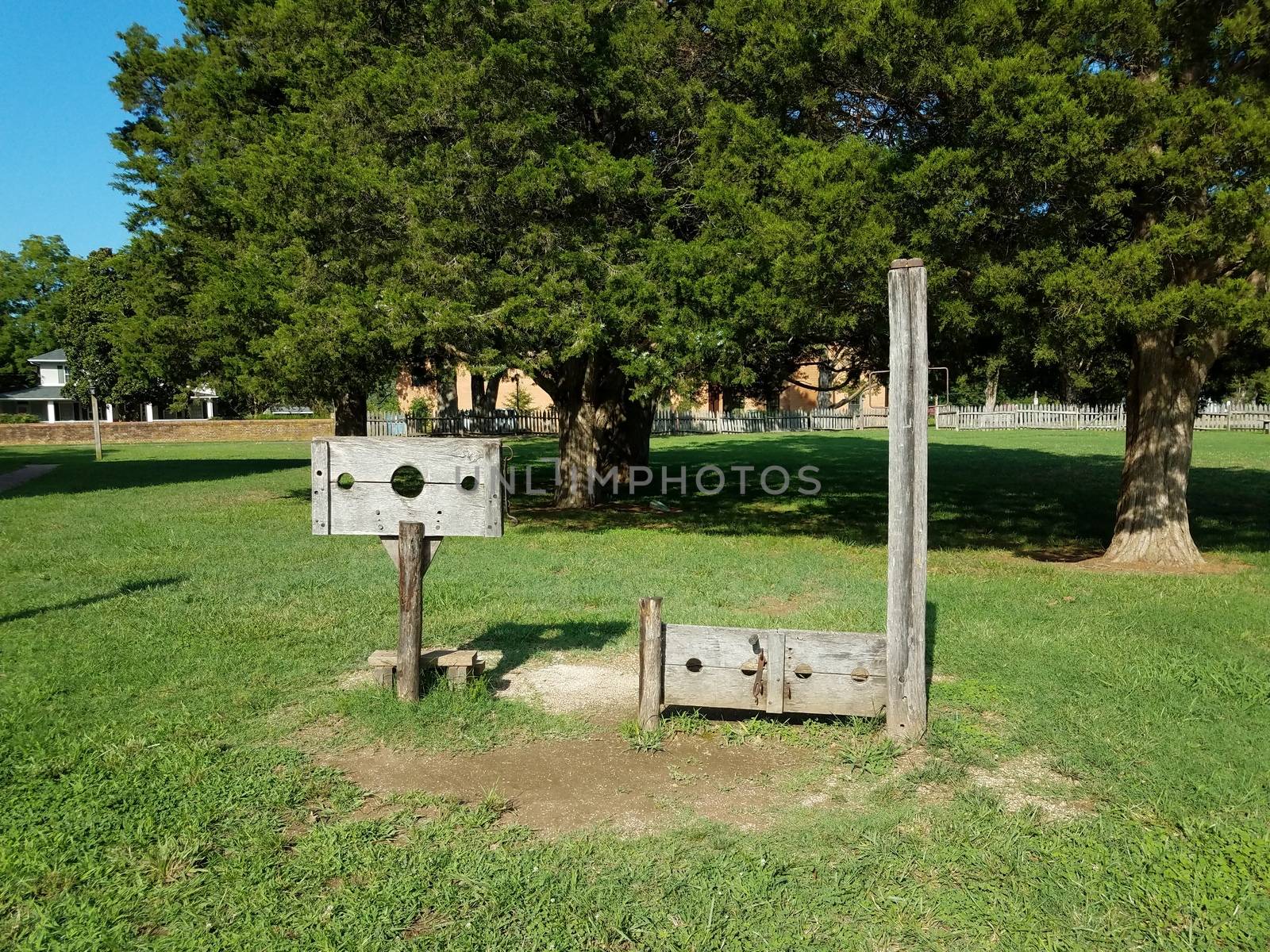 wood stock punishment device and grass or field by stockphotofan1