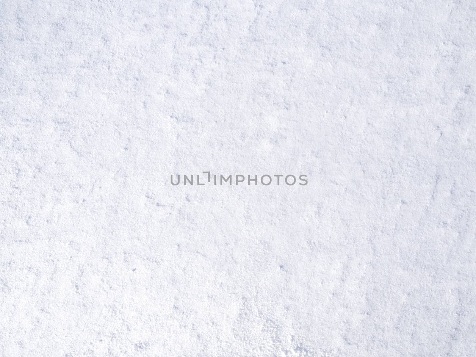 texture of white fresh snow sparkling in the sun, natural winter background by Henkeova