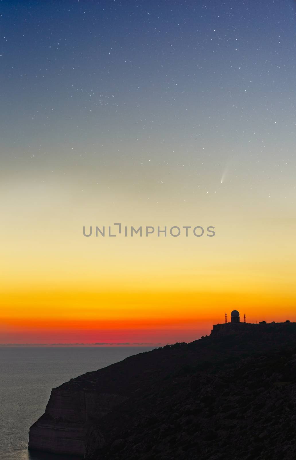 Comet C/2020 F3 (NEOWISE) and The Big Dipper grace the sky over the Dingli Radar Station right after sunset on a super-clear evening on the 21st July 2020