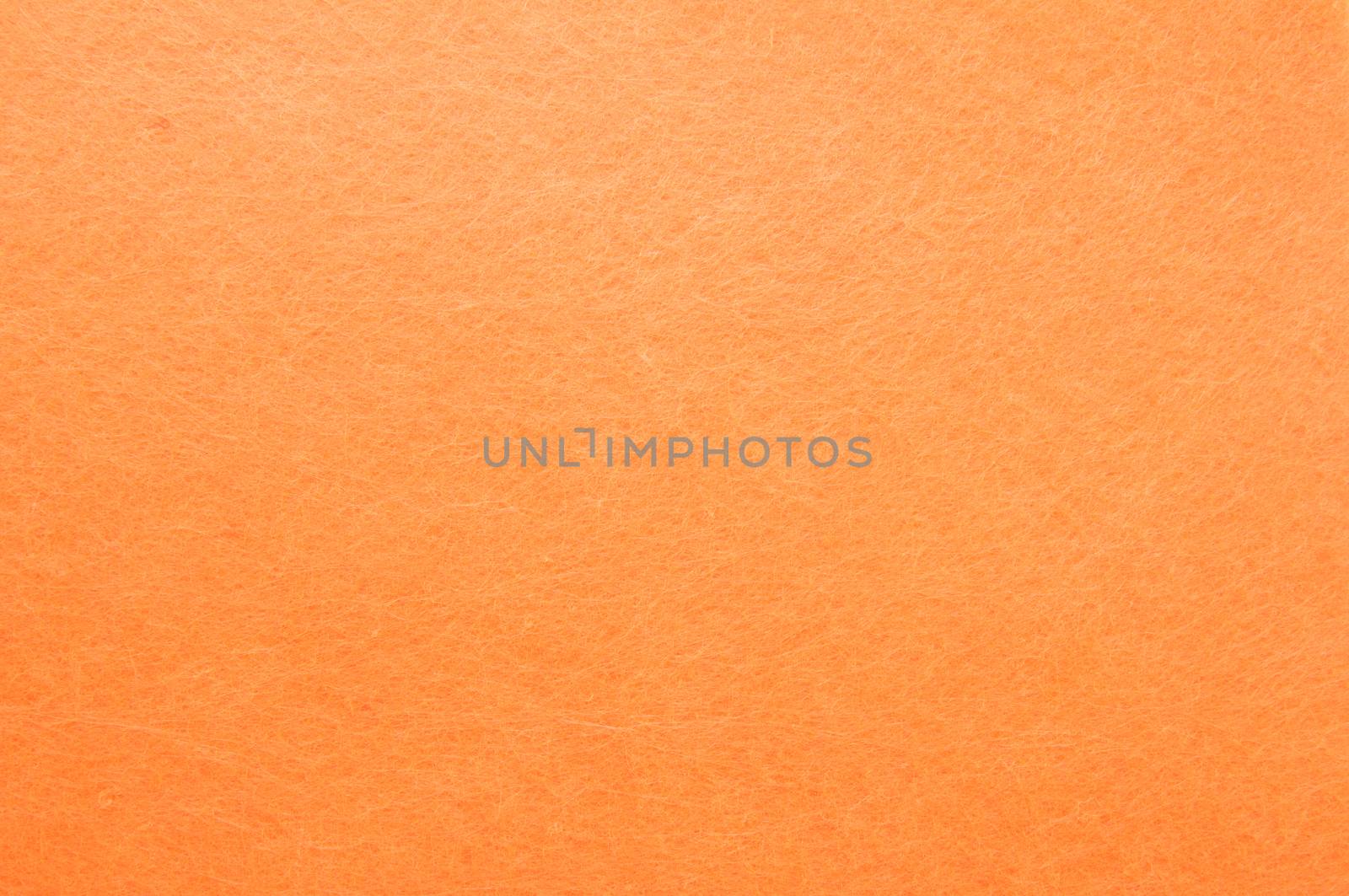 Texture background of Orange velvet or flannel as backdrop or wallpaper pattern for decoration