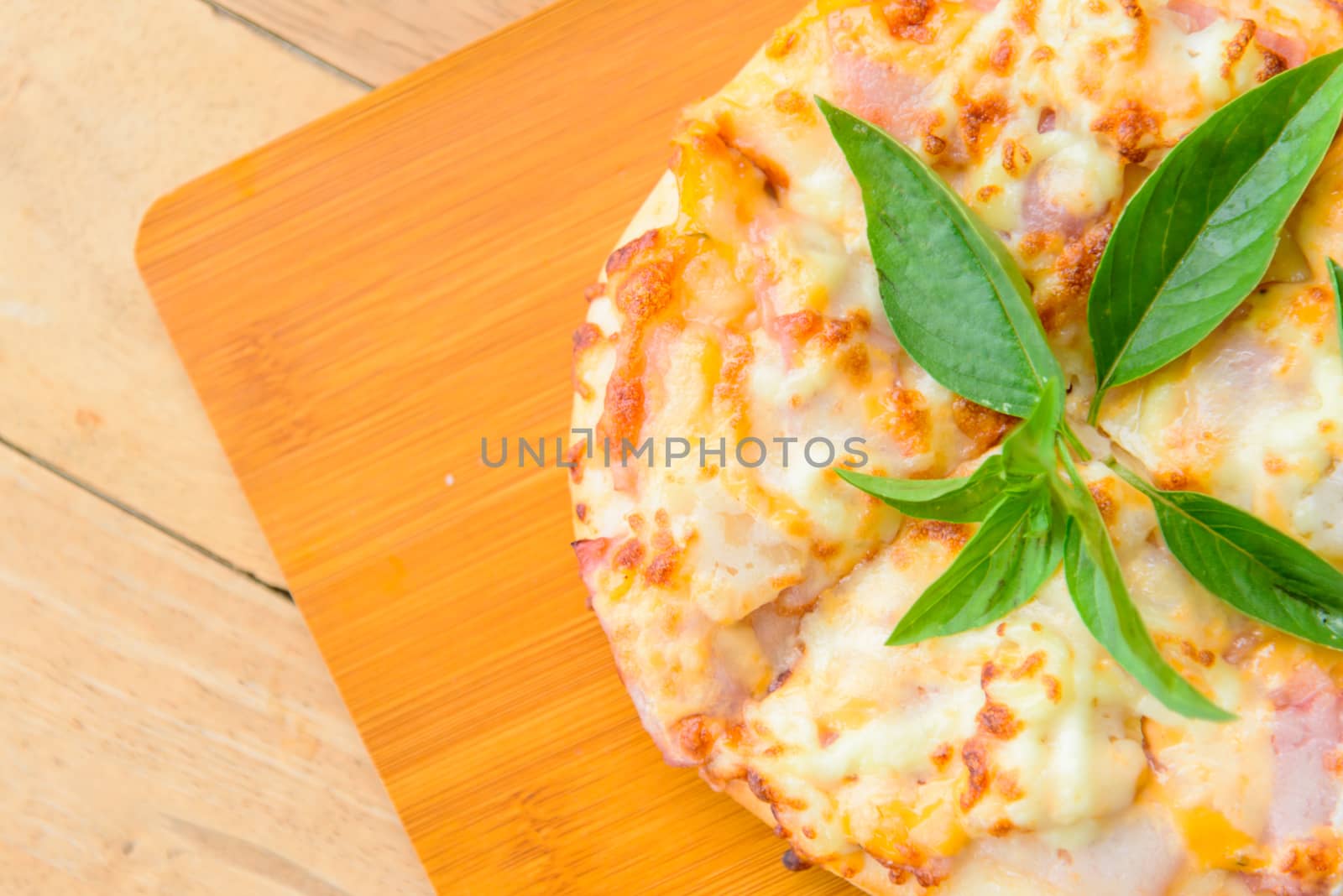 pizza Hawaiian Home made on wood plate by rukawajung