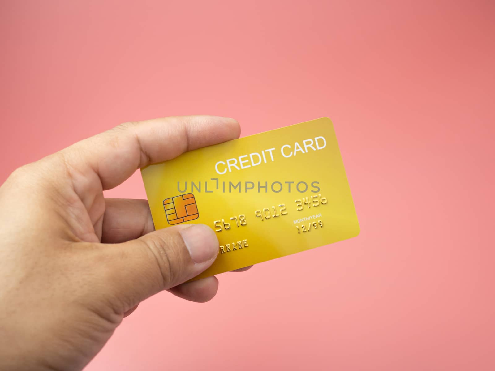 Hand man holding credit card mockup. by Unimages2527