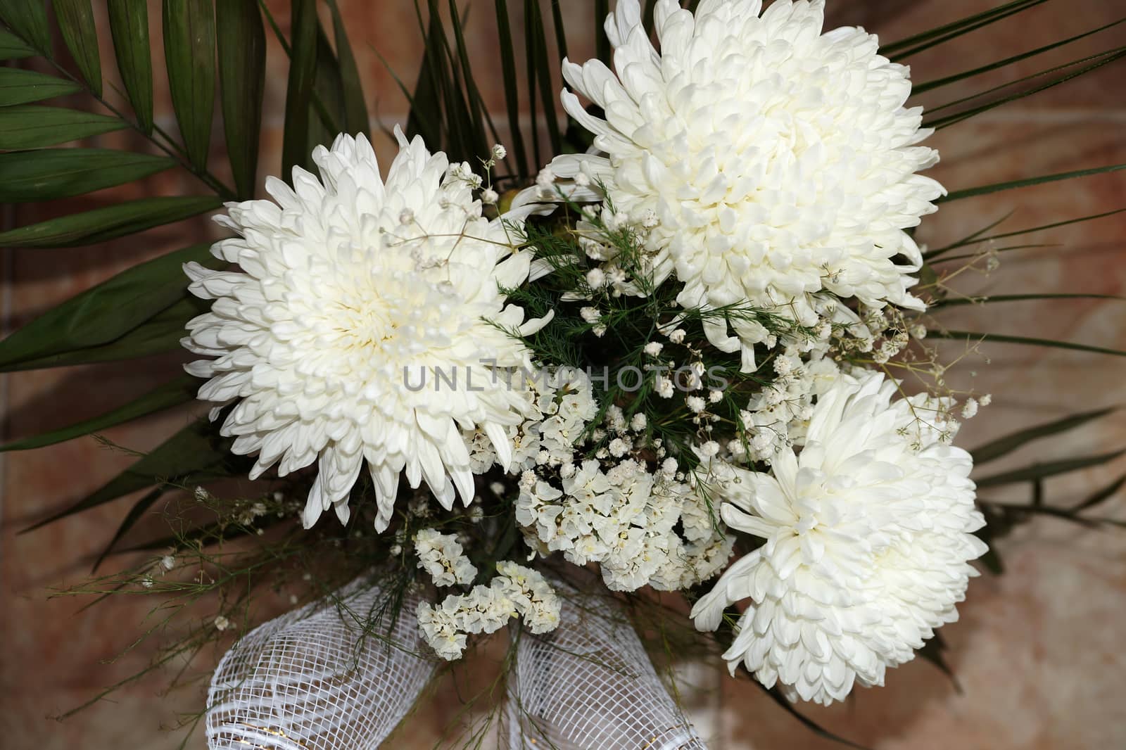 bouquet of white chrysanthemums on a light background