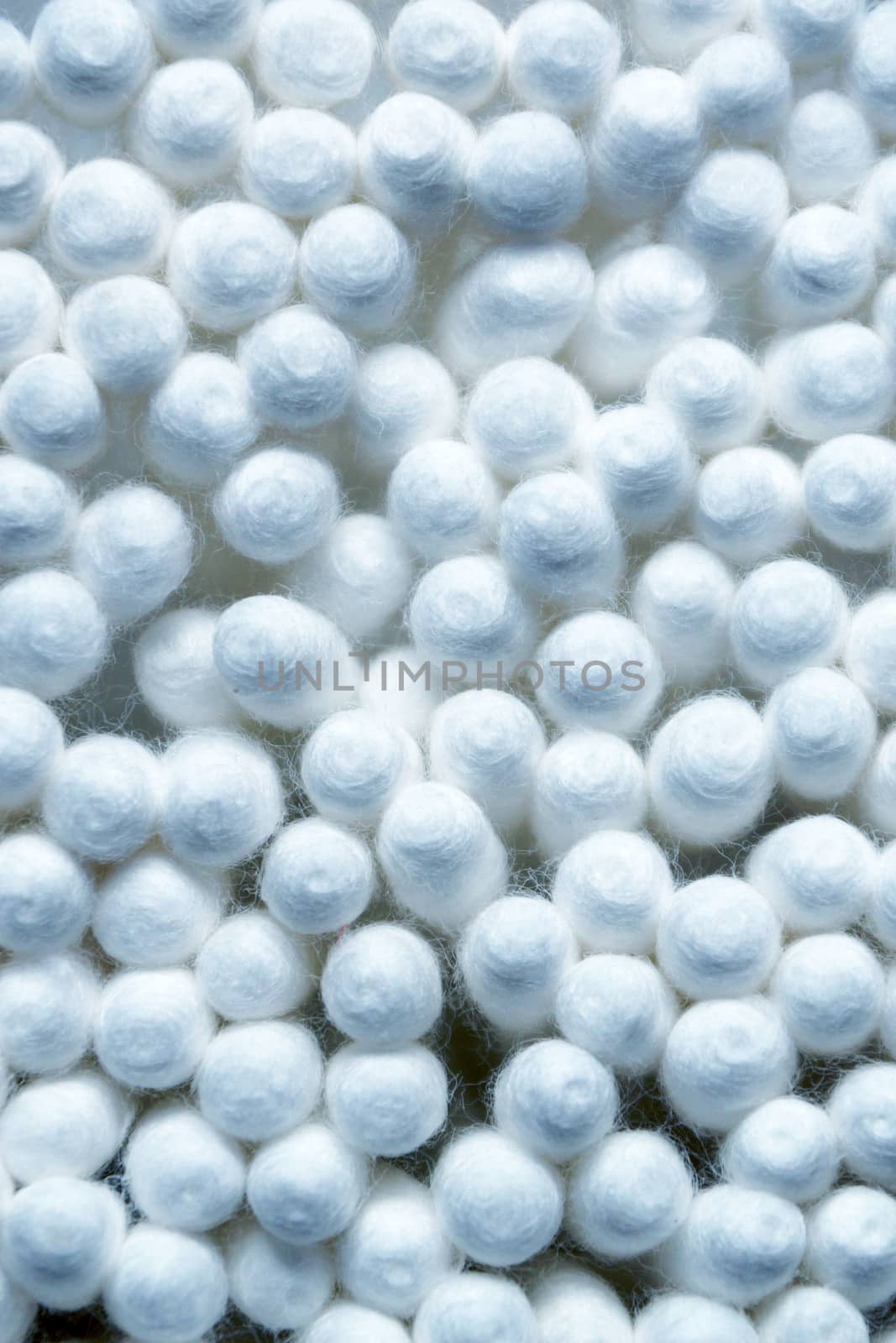 texture of white cotton swabs close up for background by Annado