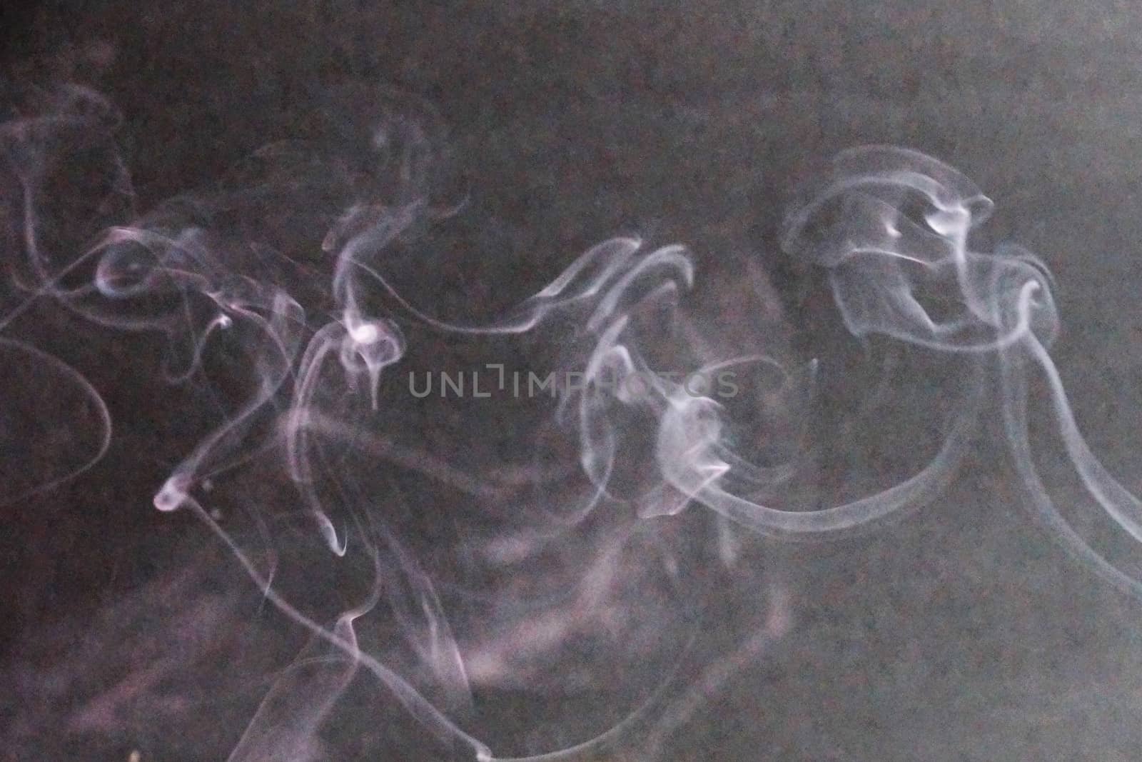 white smoke on gray background close up by Annado