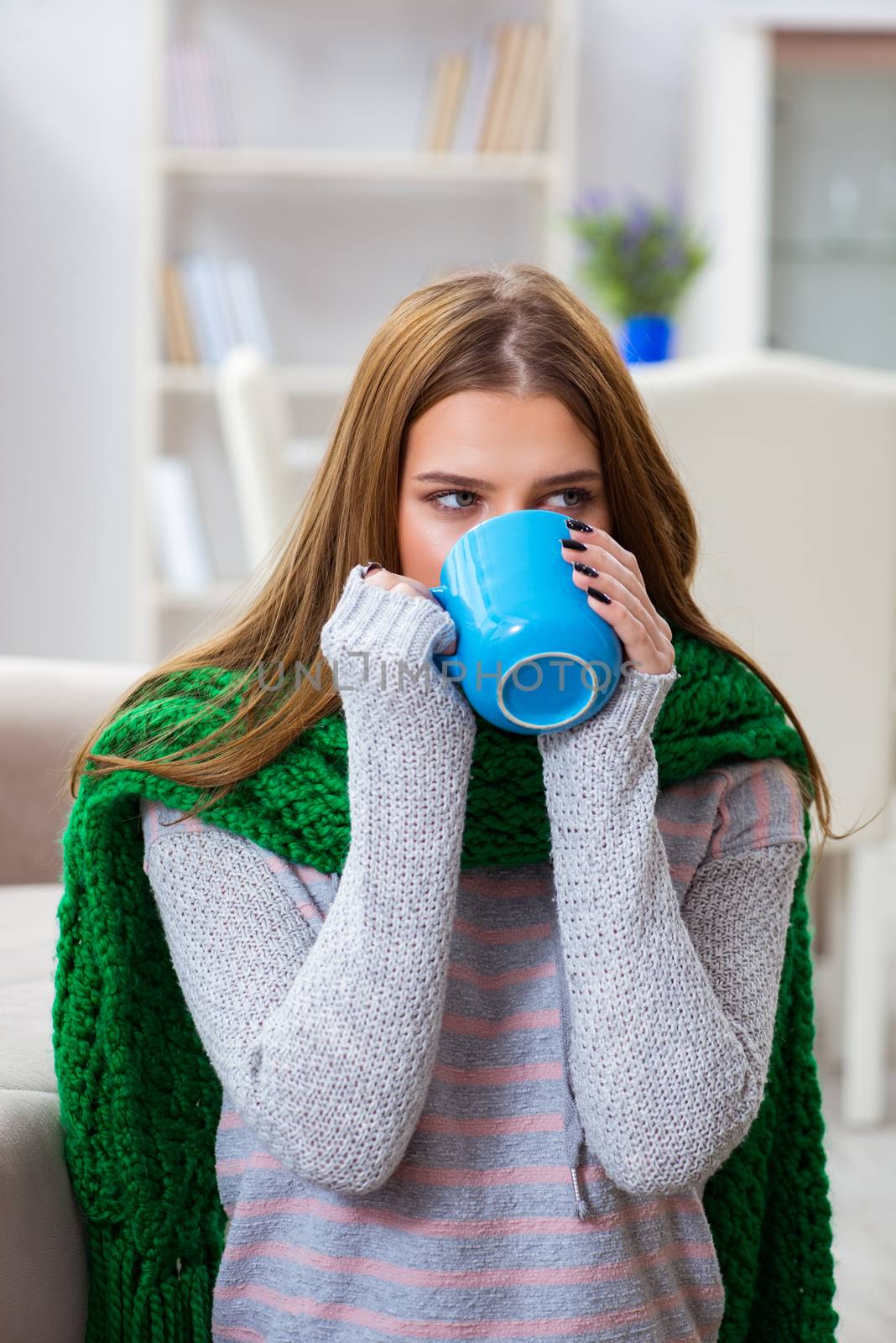 Sick woman suffering from flu at home