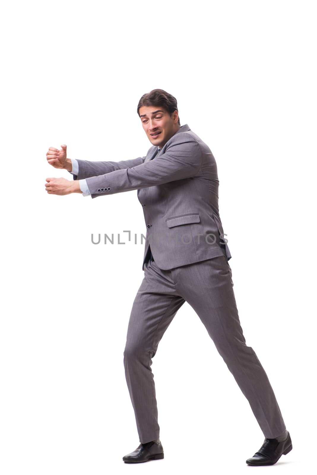 Young puppet businessman isolated on white background
