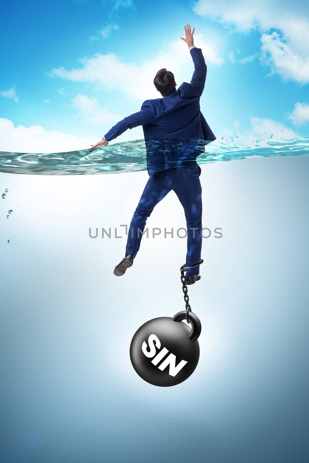 Businessman drowning under the burden of sin and guilt