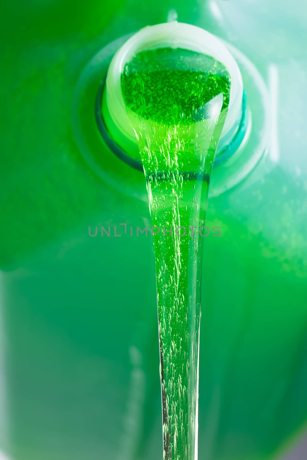 pouring liquid soap, close-up view by nikkytok