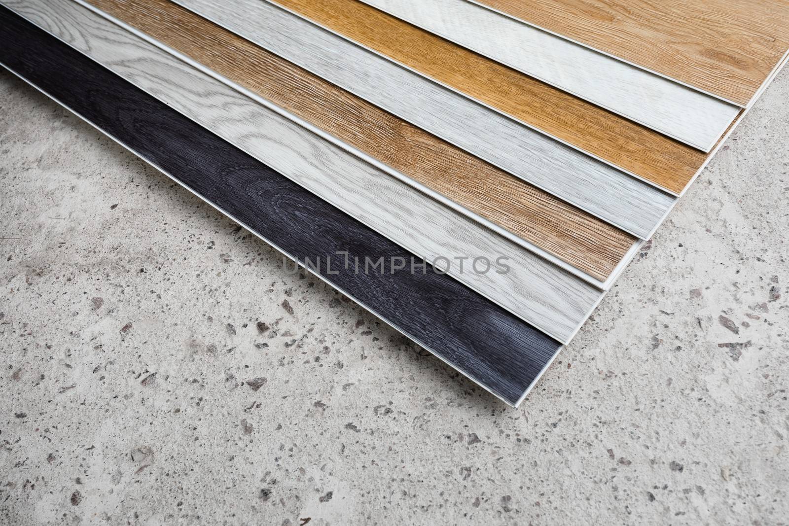 laminate flooring planks variations on concrete floor by nikkytok