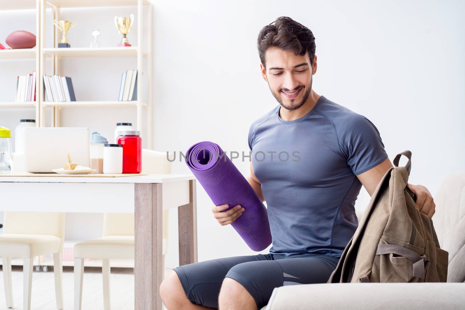 Young man getting ready for gym sports