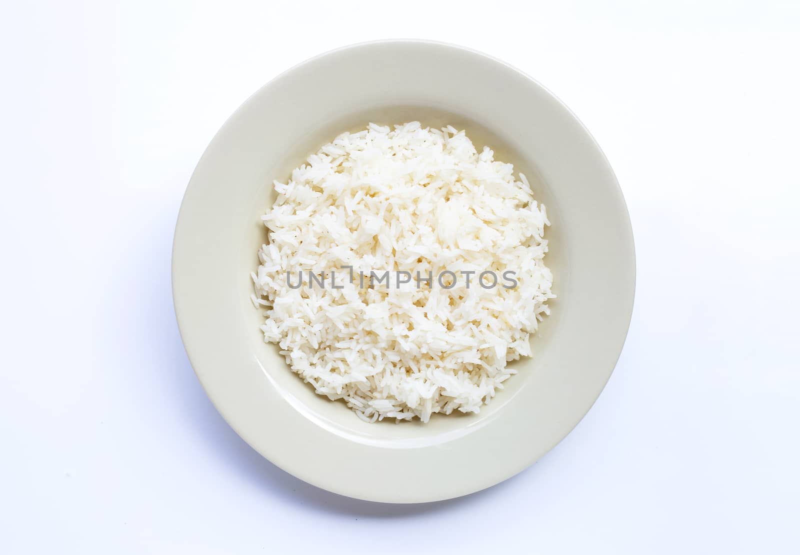 Dish of rice on white background. Top view