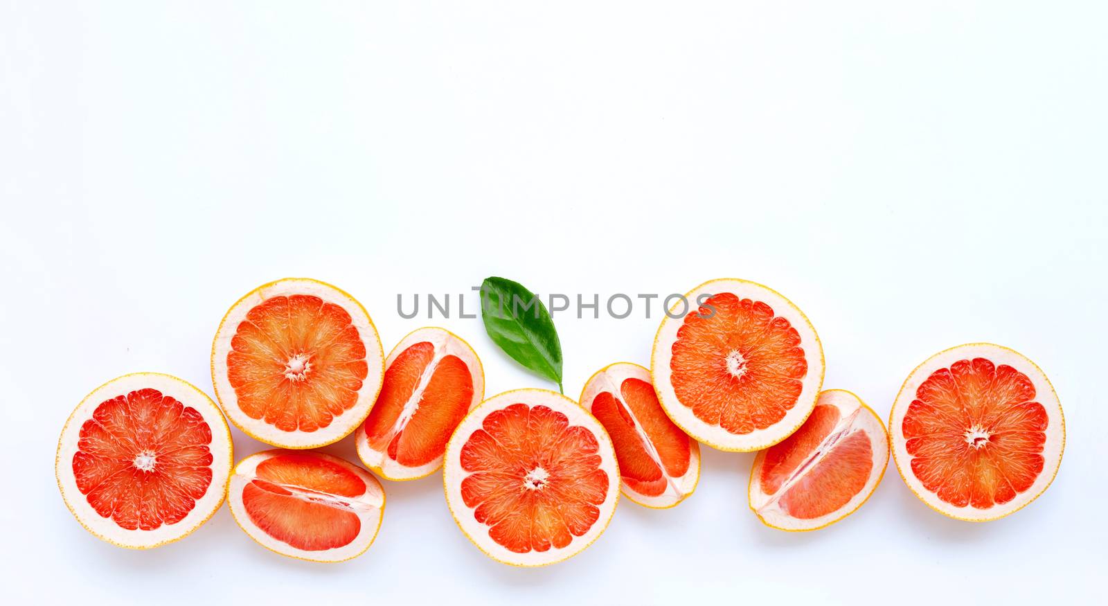 High vitamin C. Juicy grapefruit on white background.