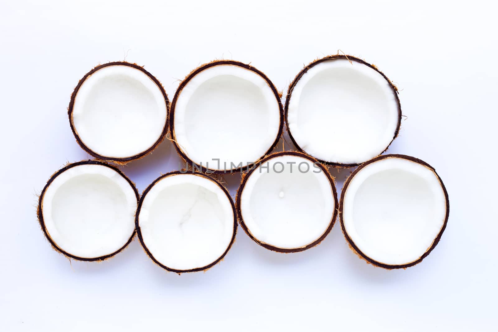 Coconuts isolated on white background. Top view 