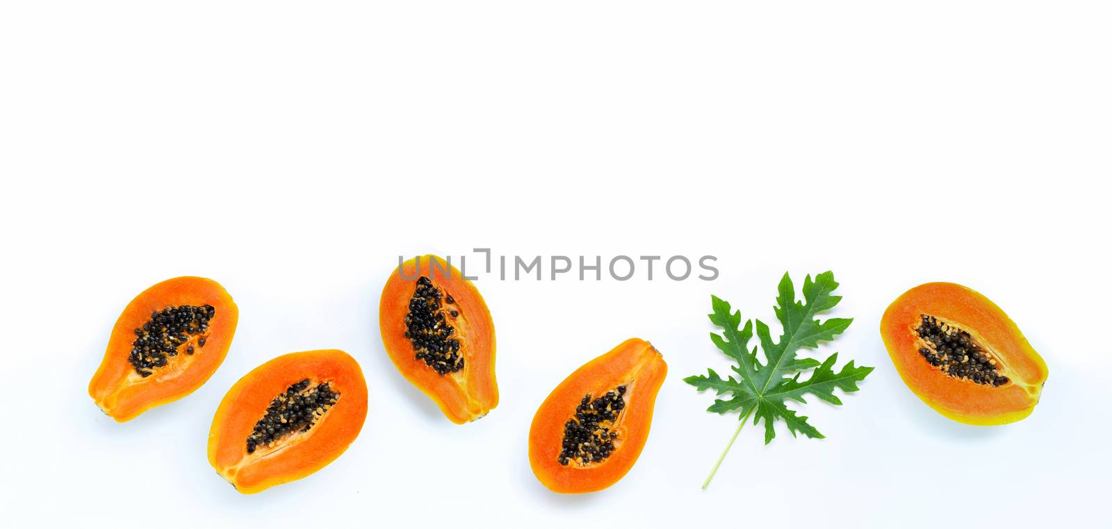 Papaya fruit on white background. Top view