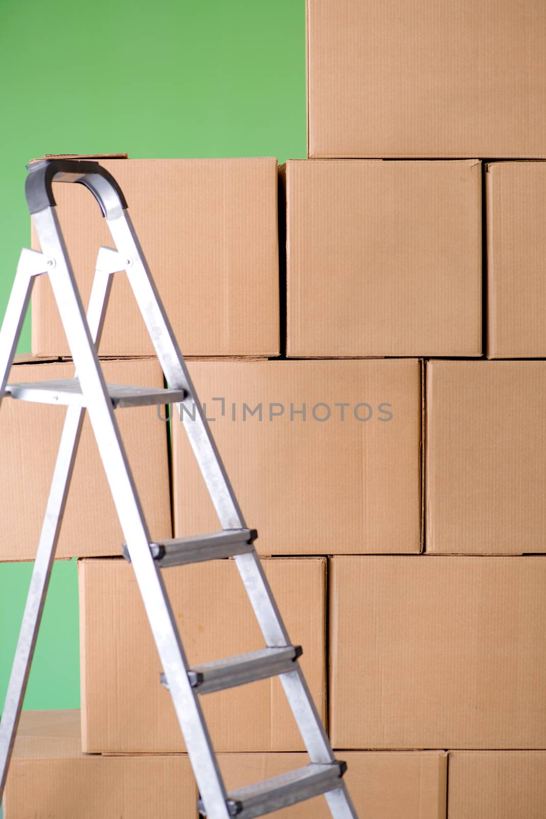 Many boxes and ladder in depot