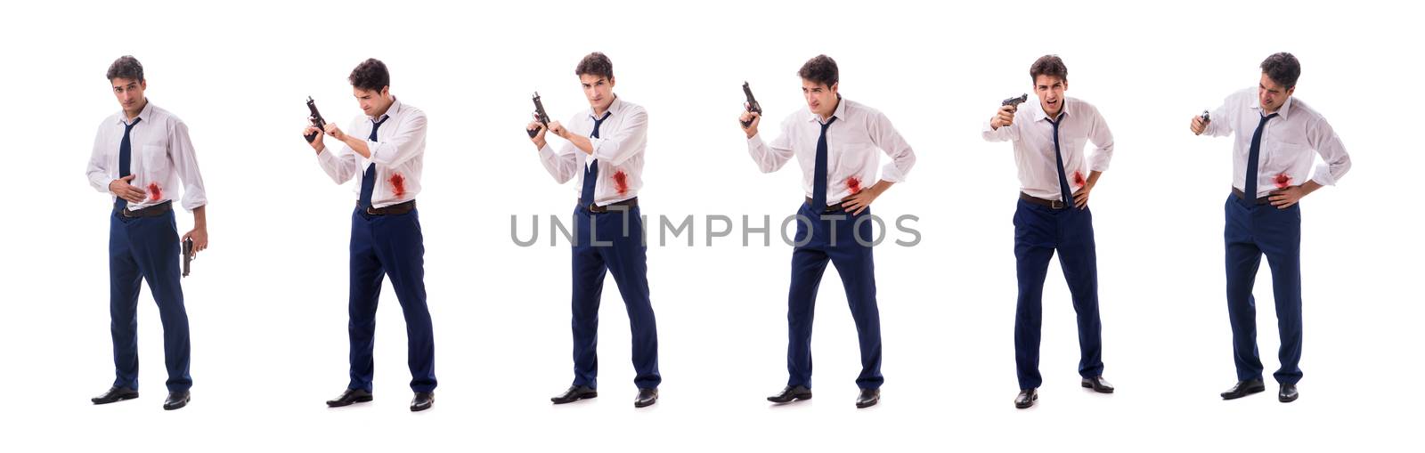 Businessman wounded in gun fight isolated on white