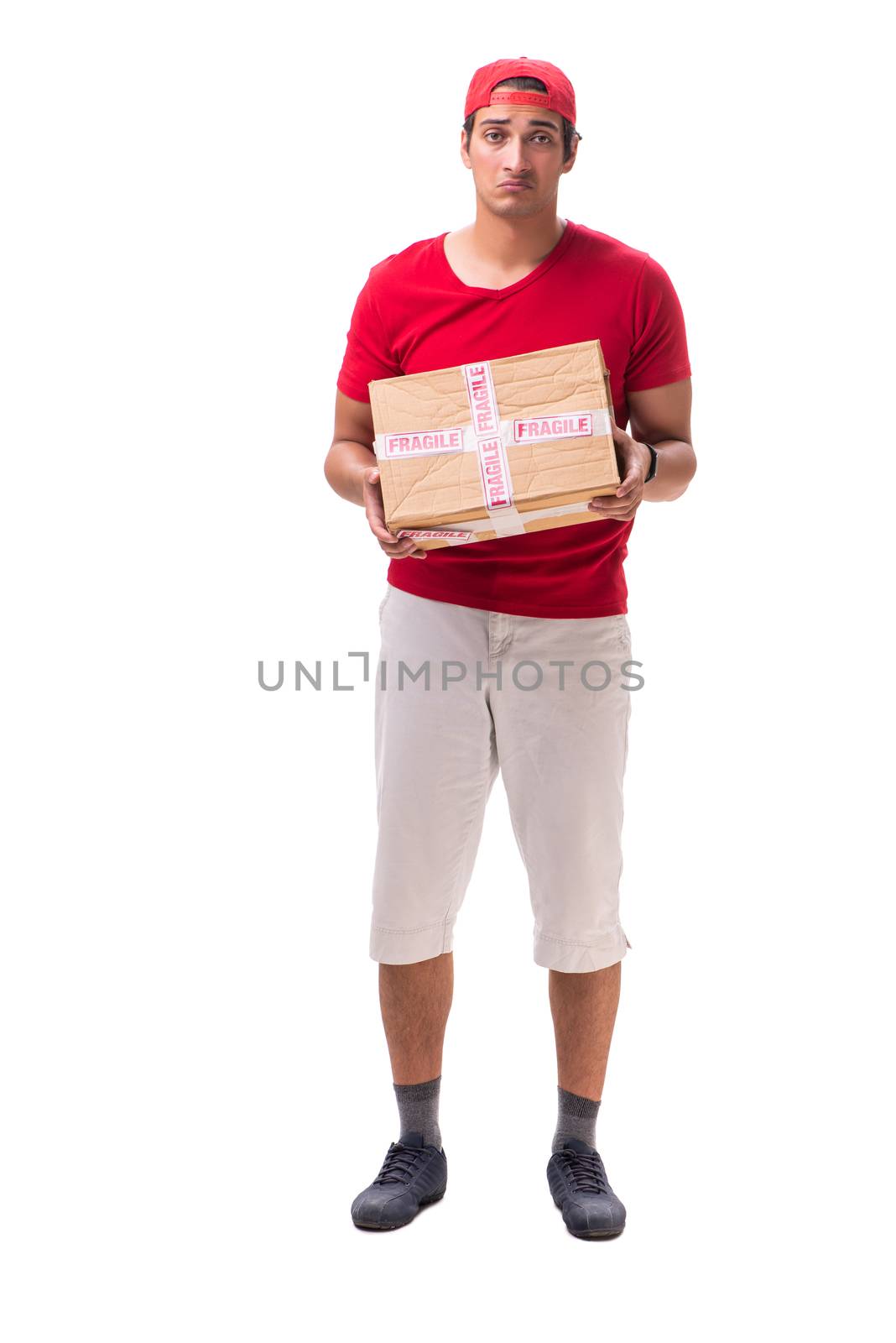 Handsome contractor holding fragile box isolated on white 