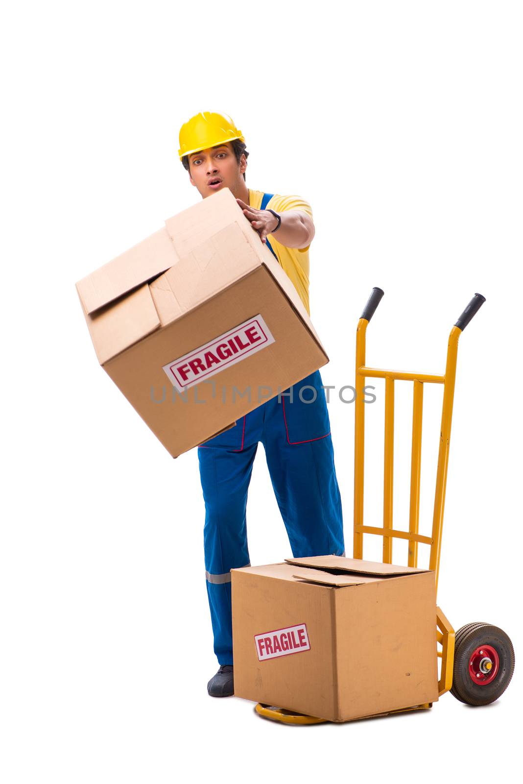 Young contractor with fragile boxes isolated on white