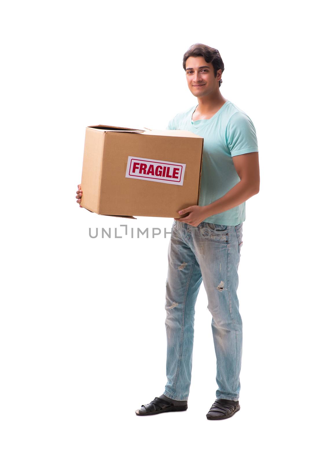 Young handsome man with fragile box ordered from Internet 