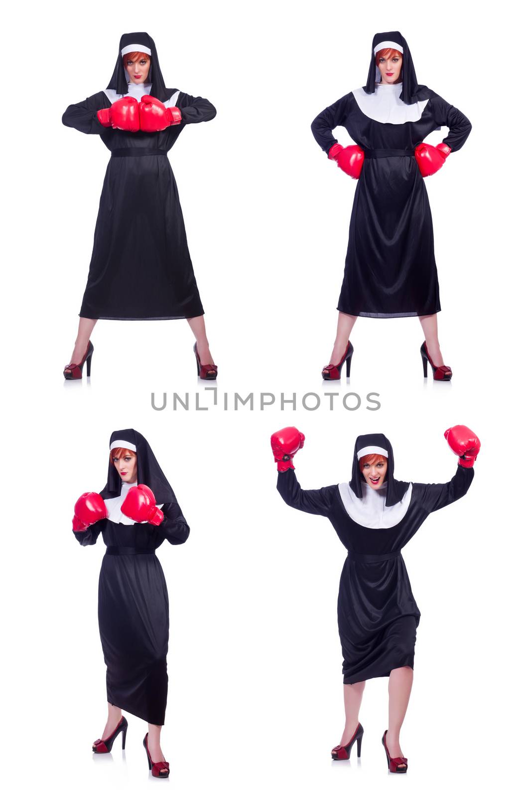 Nun with boxing gloves isolated on white