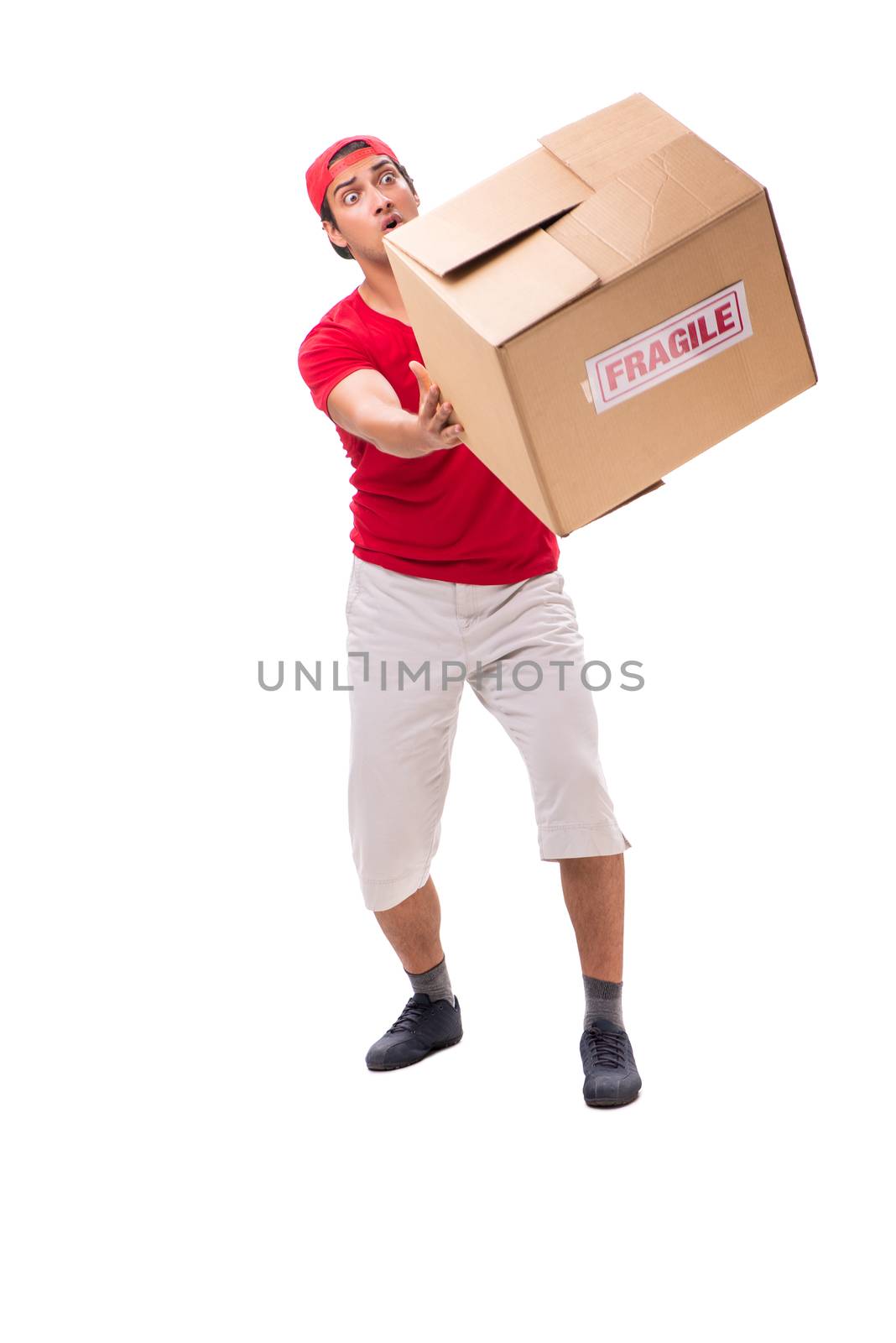 Handsome contractor holding fragile box isolated on white 