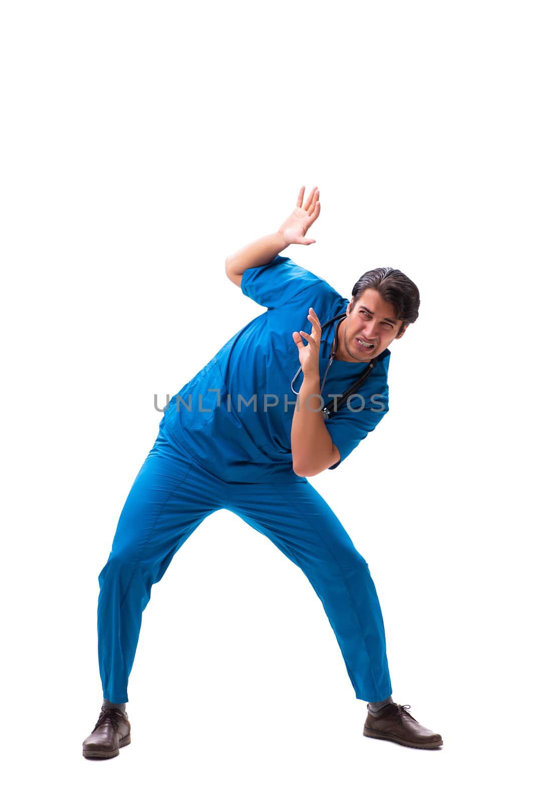 Young handsome doctor isolated on white