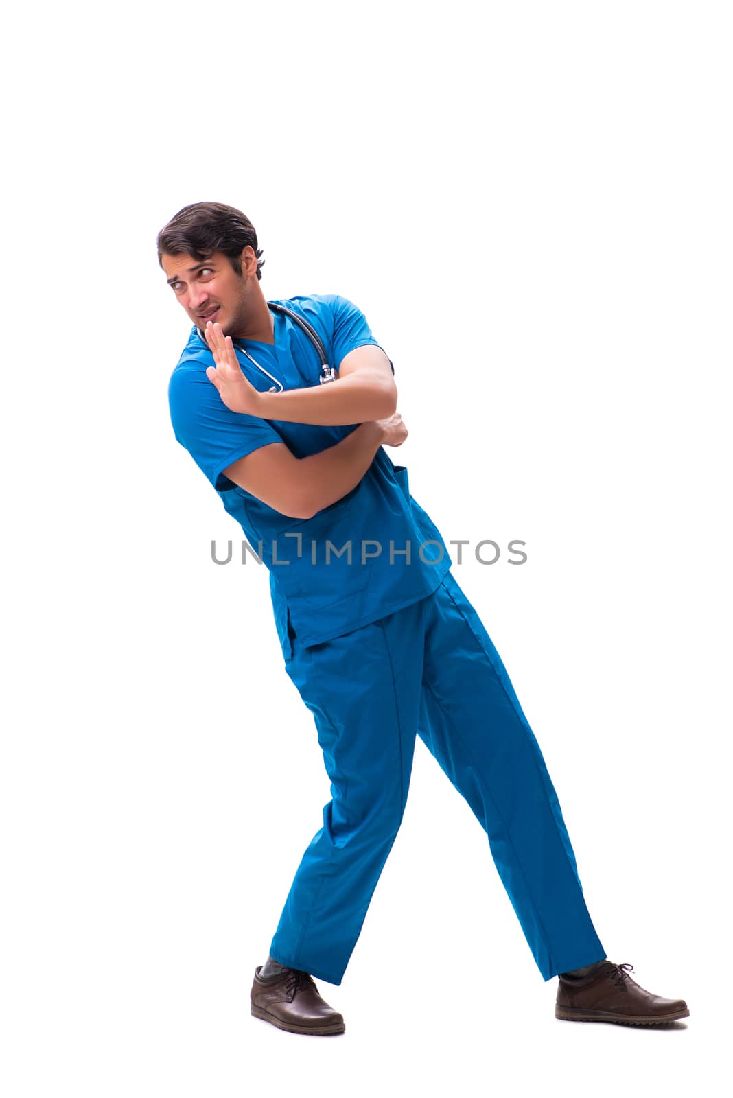 Young handsome doctor isolated on white